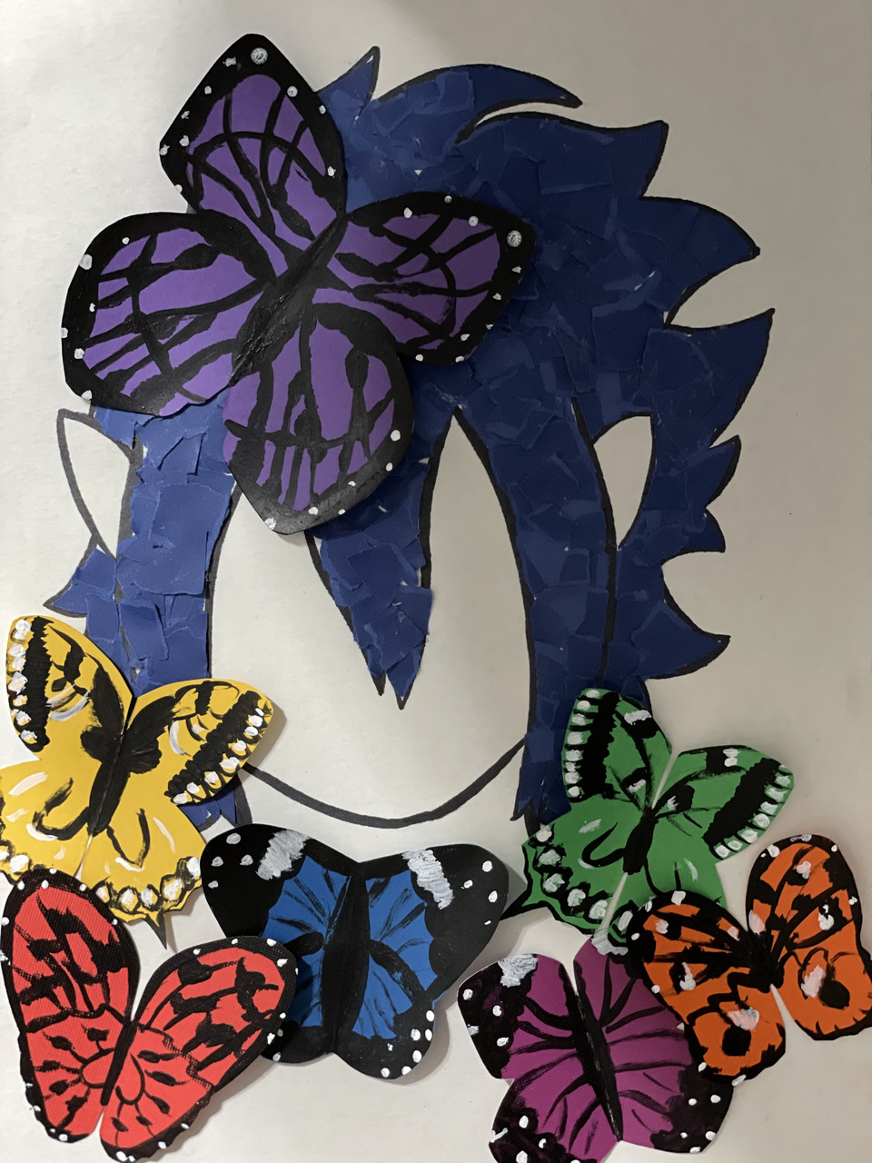 Butterflies and a face with blue hair and cat ears
