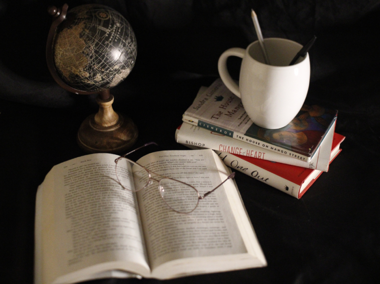 Still life including glasses on a book