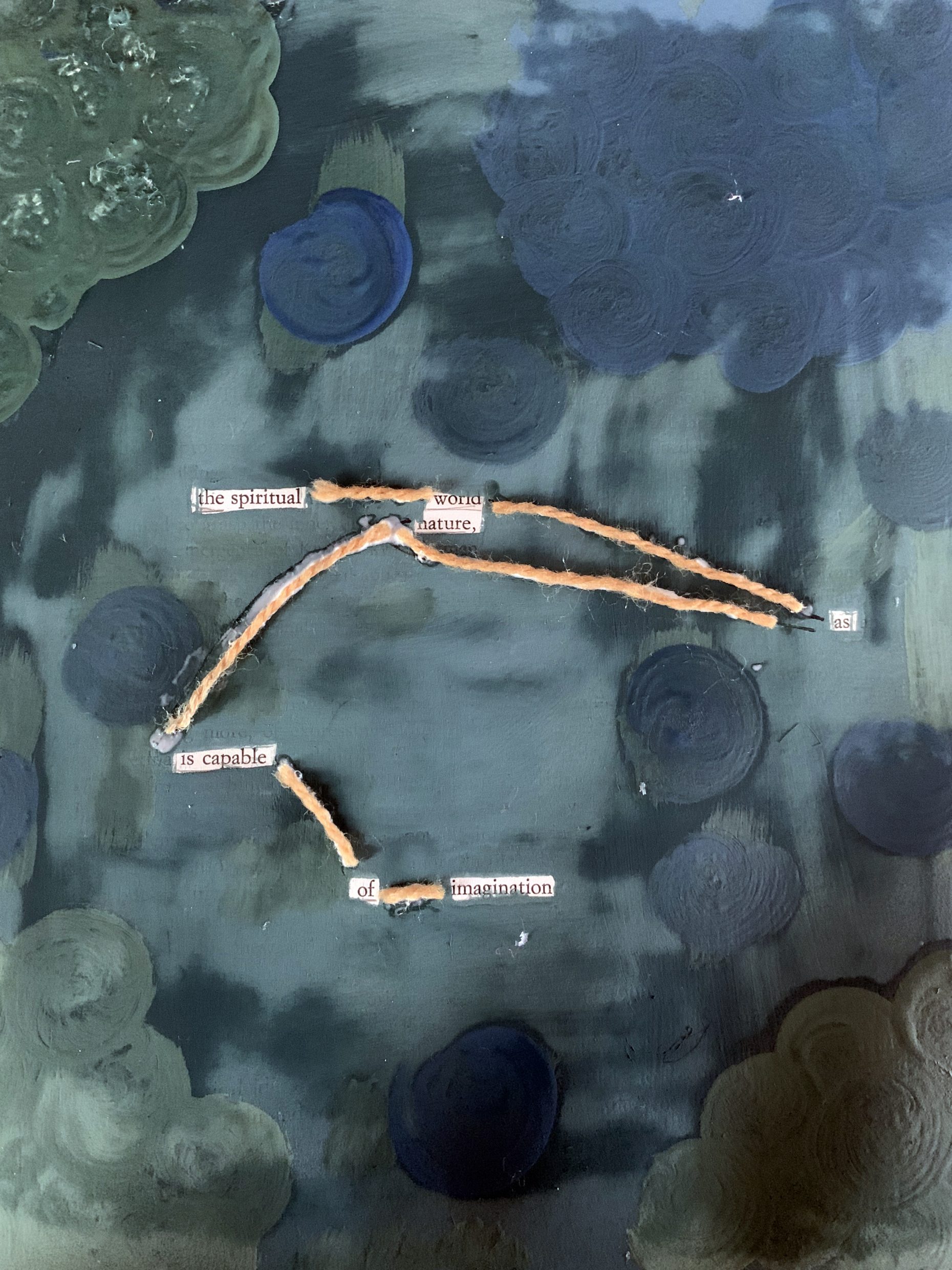 Paint over a page obscuring letters to reveal a poem