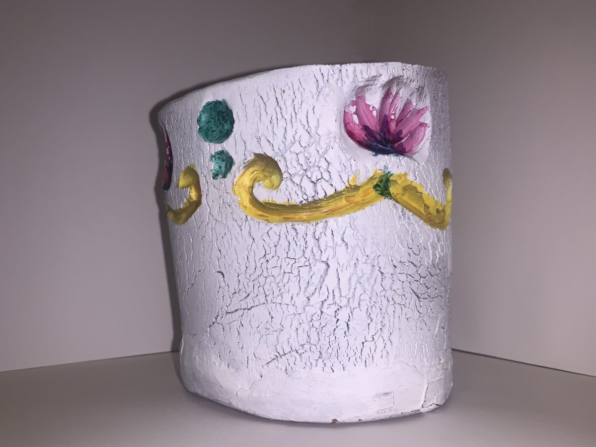 Ceramic mug with white, pink, and yellow glaze