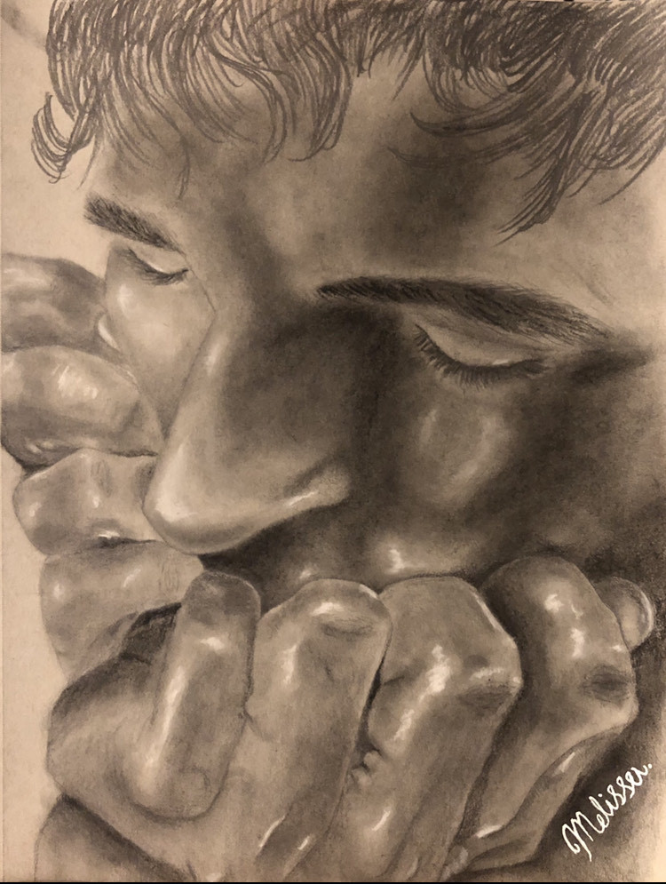 Charcoal Drawing of a person with their hands in their face