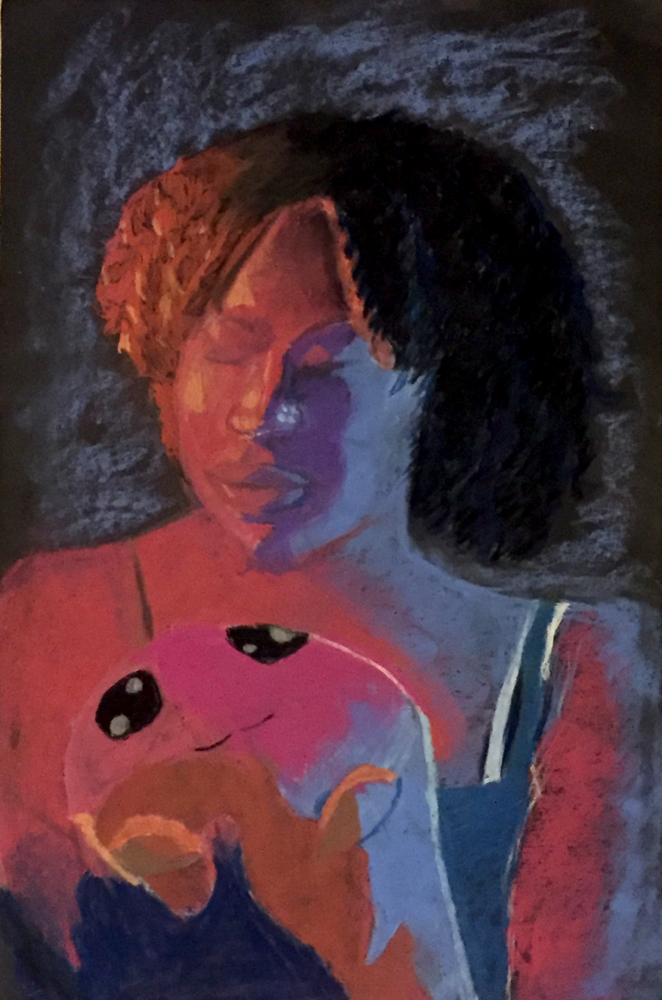 Person with eyes closed holding a stuffed toy to their chest