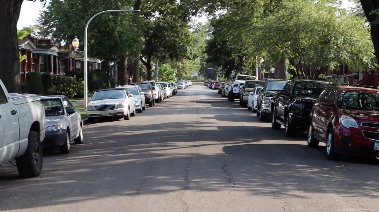 Cars parked on both sides of the street