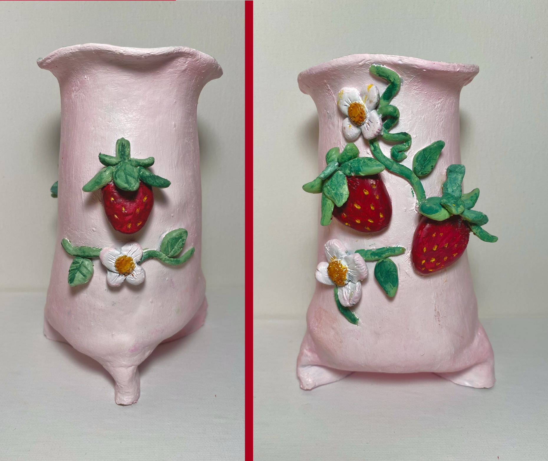Ceramic vase with strawberries on it