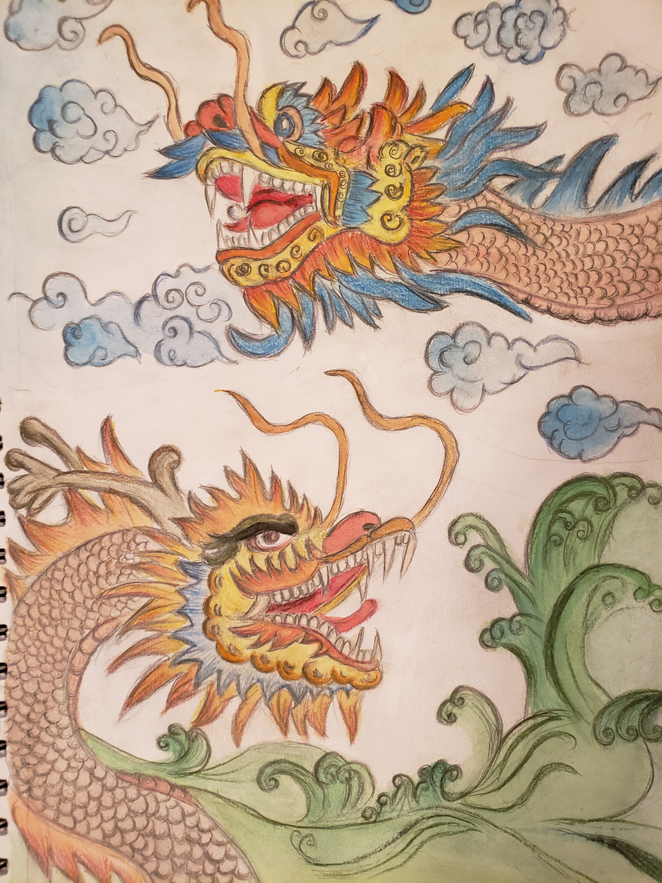 Drawing of two dragons in front of clouds