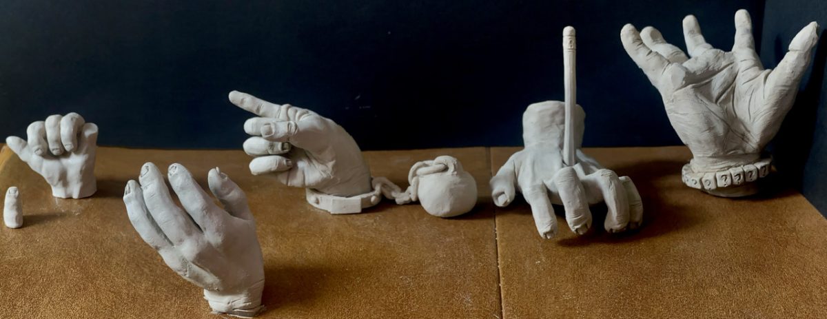 A series of clary sculptures of hands