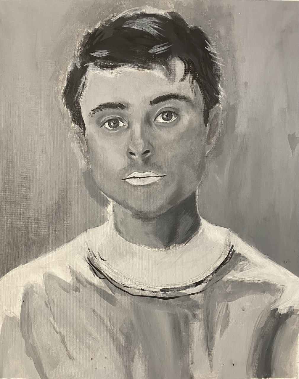 Black and white portrait of a boy with black hair
