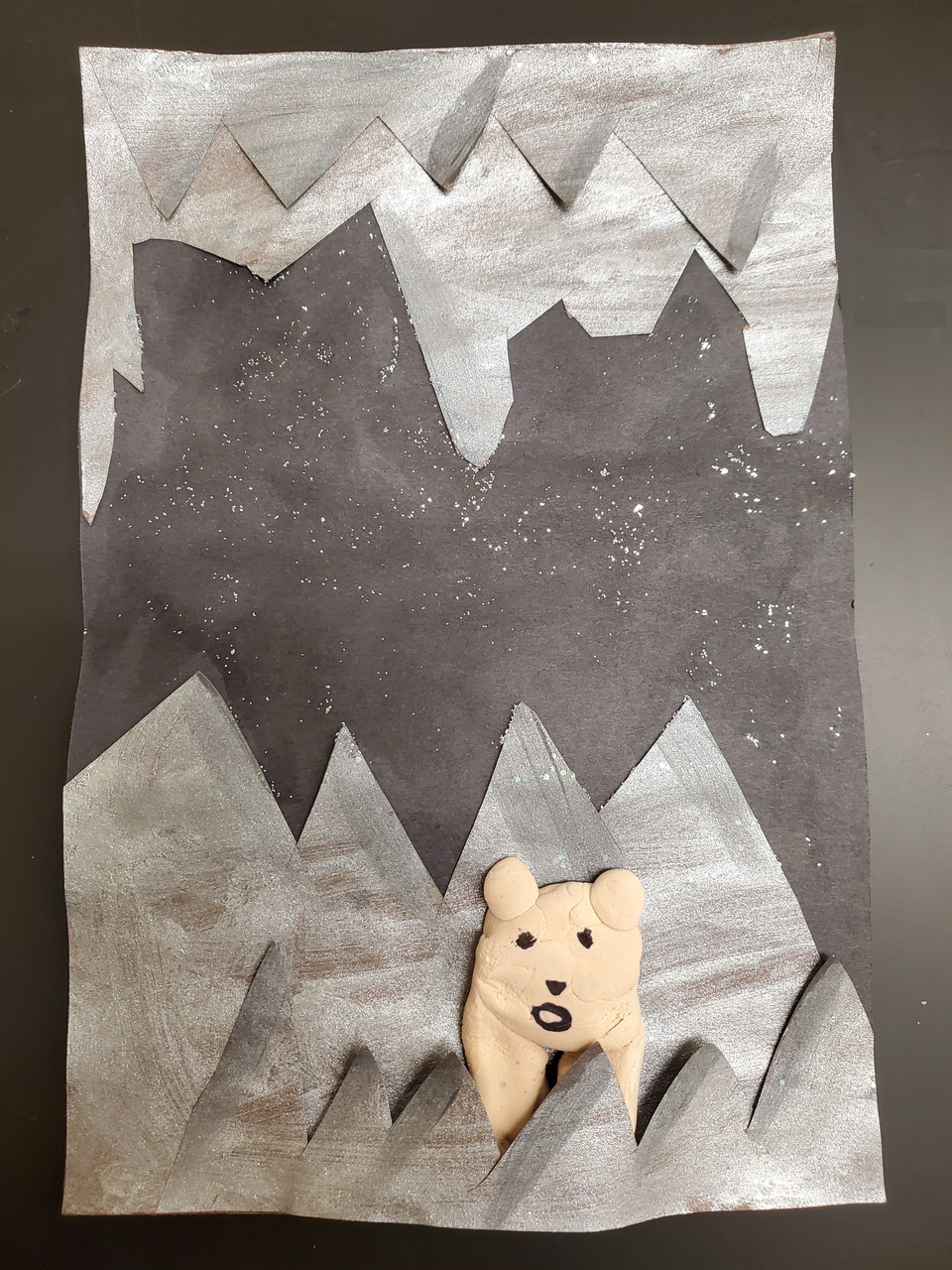 collage bear in mountain cave