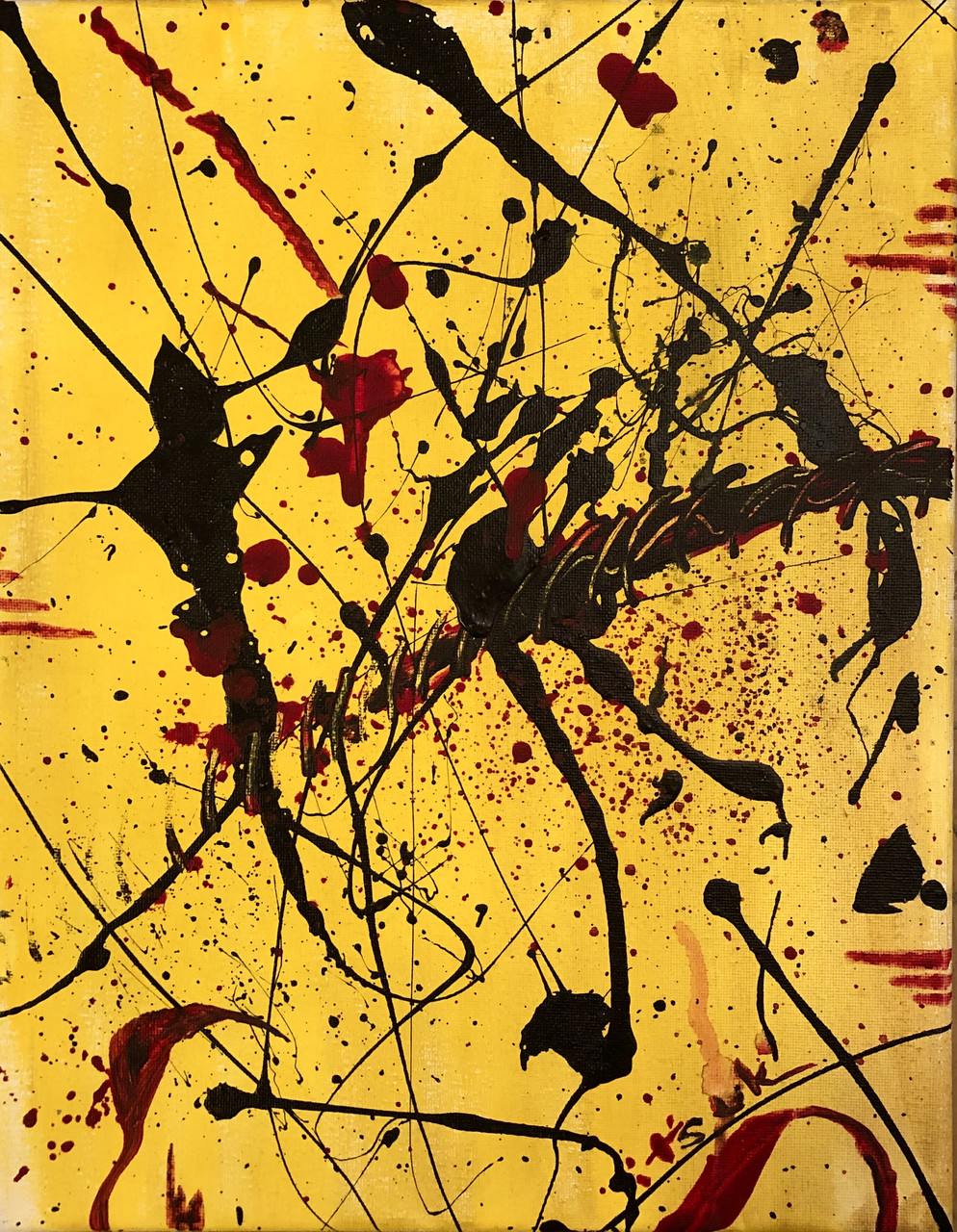 Yellow background with black and red splatters