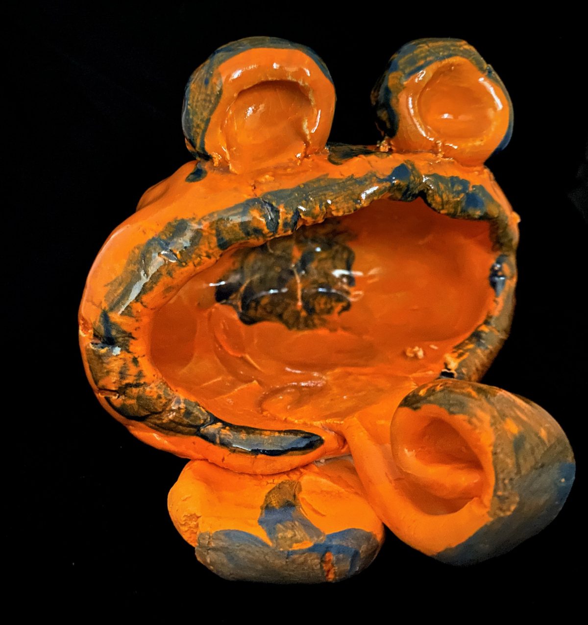 Orange ceramic frog
