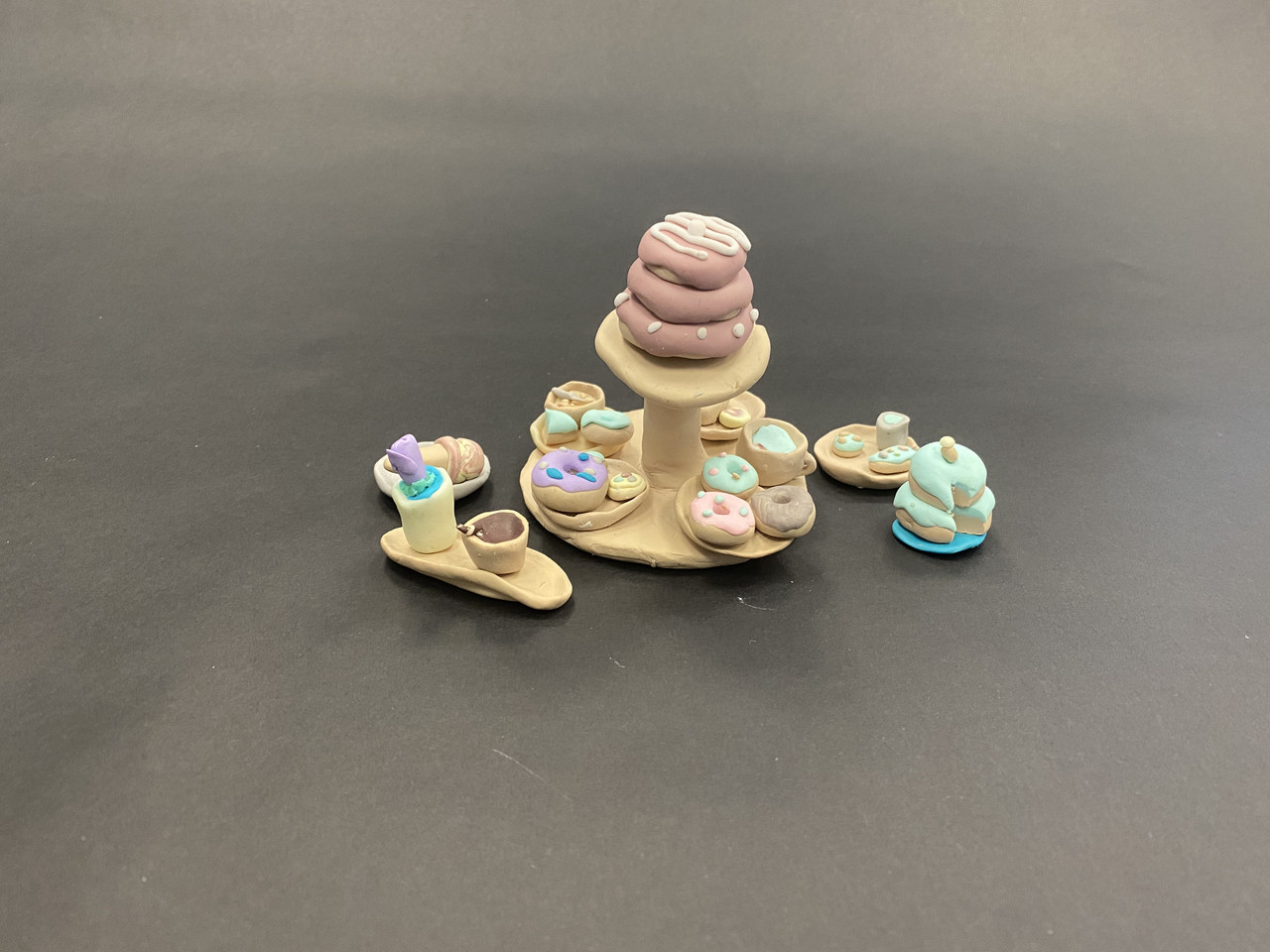 Image of clay pastries on table.
