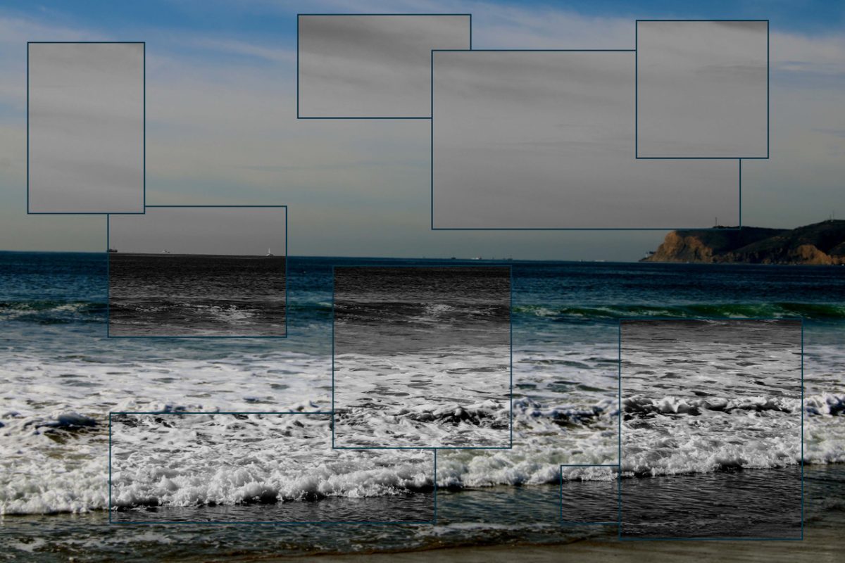 Photo of ocean in color with black & white boxes