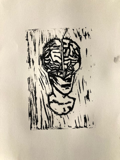 ink image of a brain on face