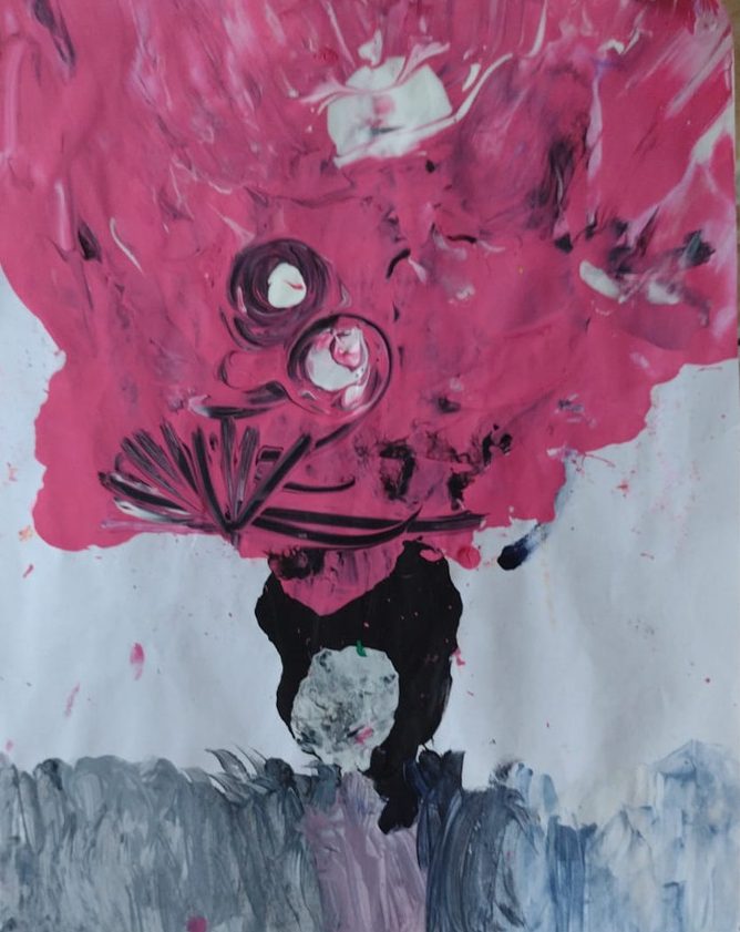 pink exploding out of black vessel