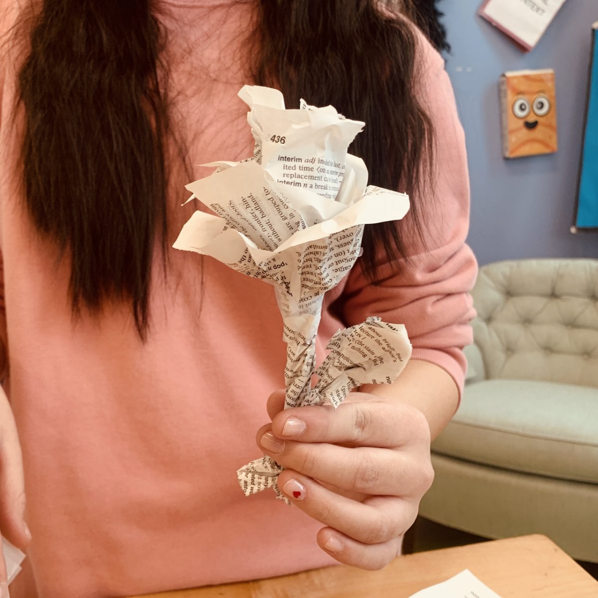 Sculpture rose made from pages in a dictionary