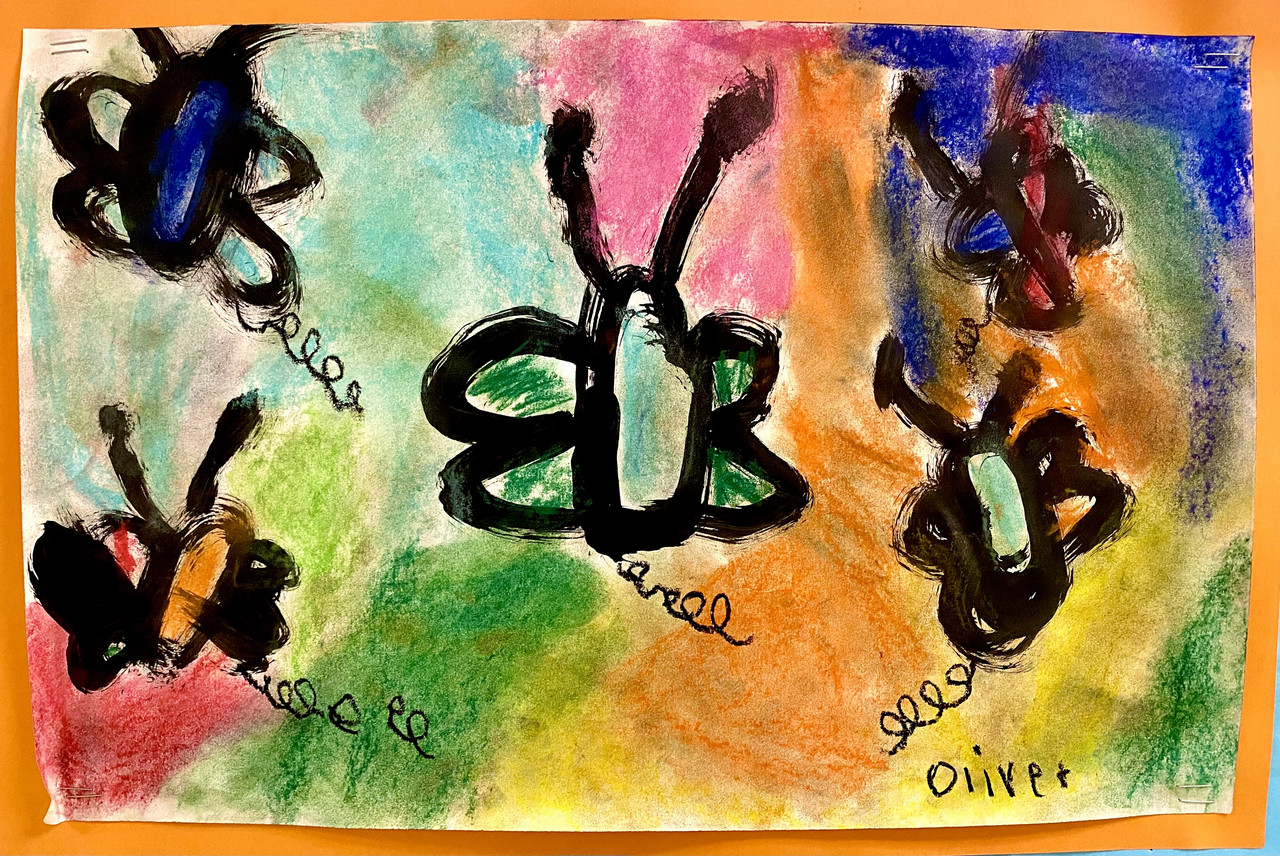 A painting of pastel colored butterflies