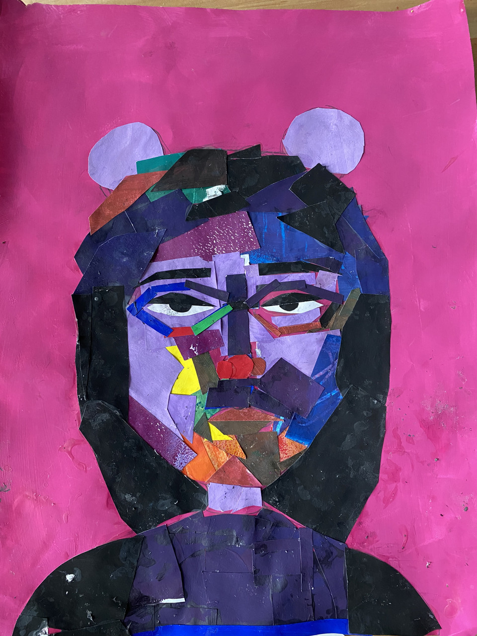 painted collage of girl with space buns on a pink background