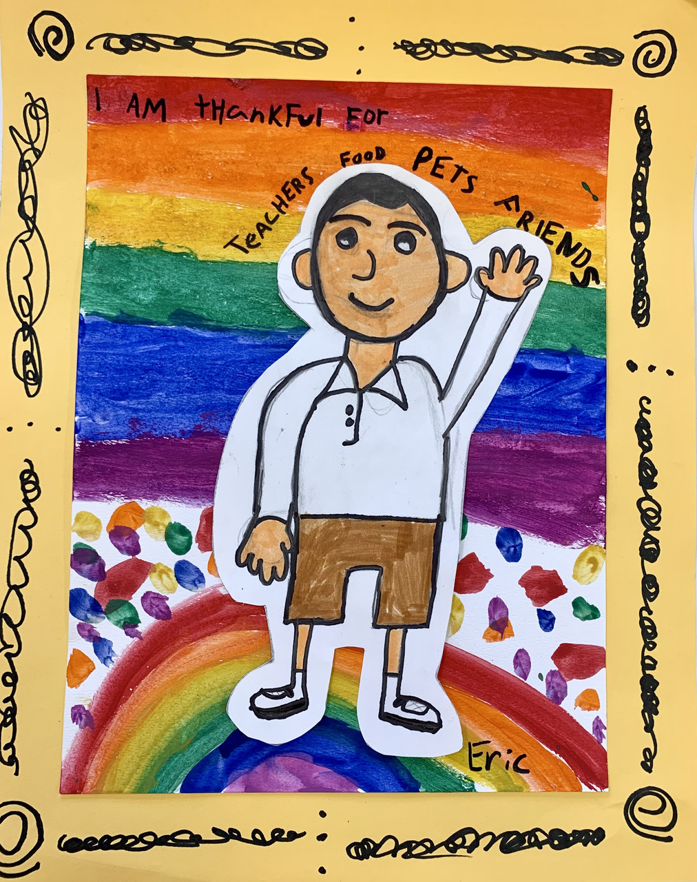 Self portrait in front of a rainbow