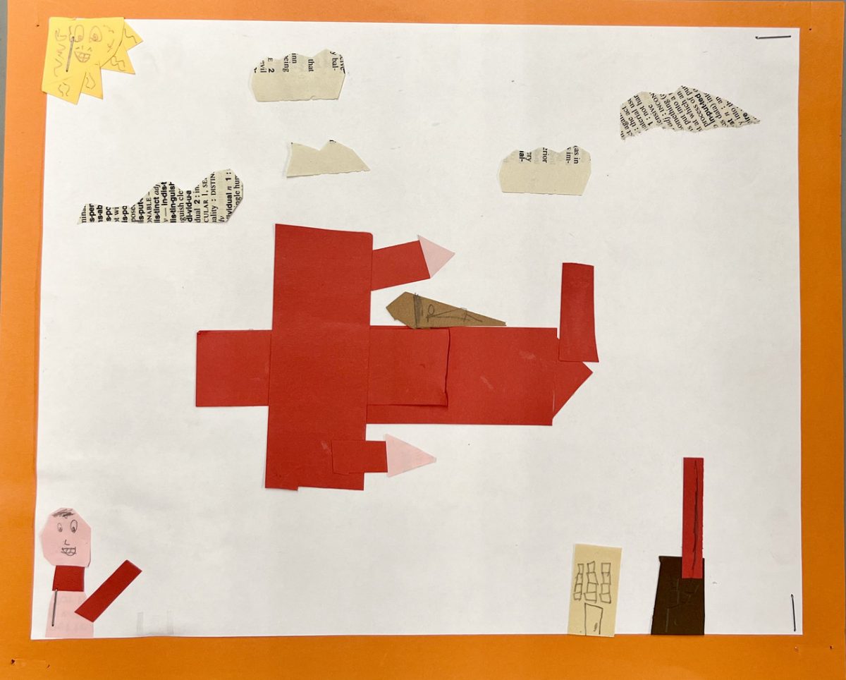 A red object flies above a city.