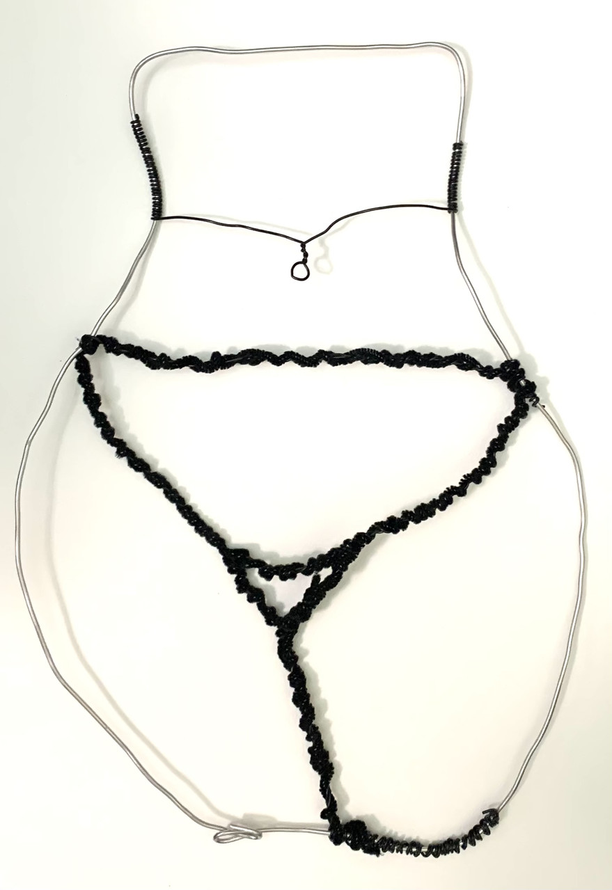 Wire shaped to look like a girls hips and stomach