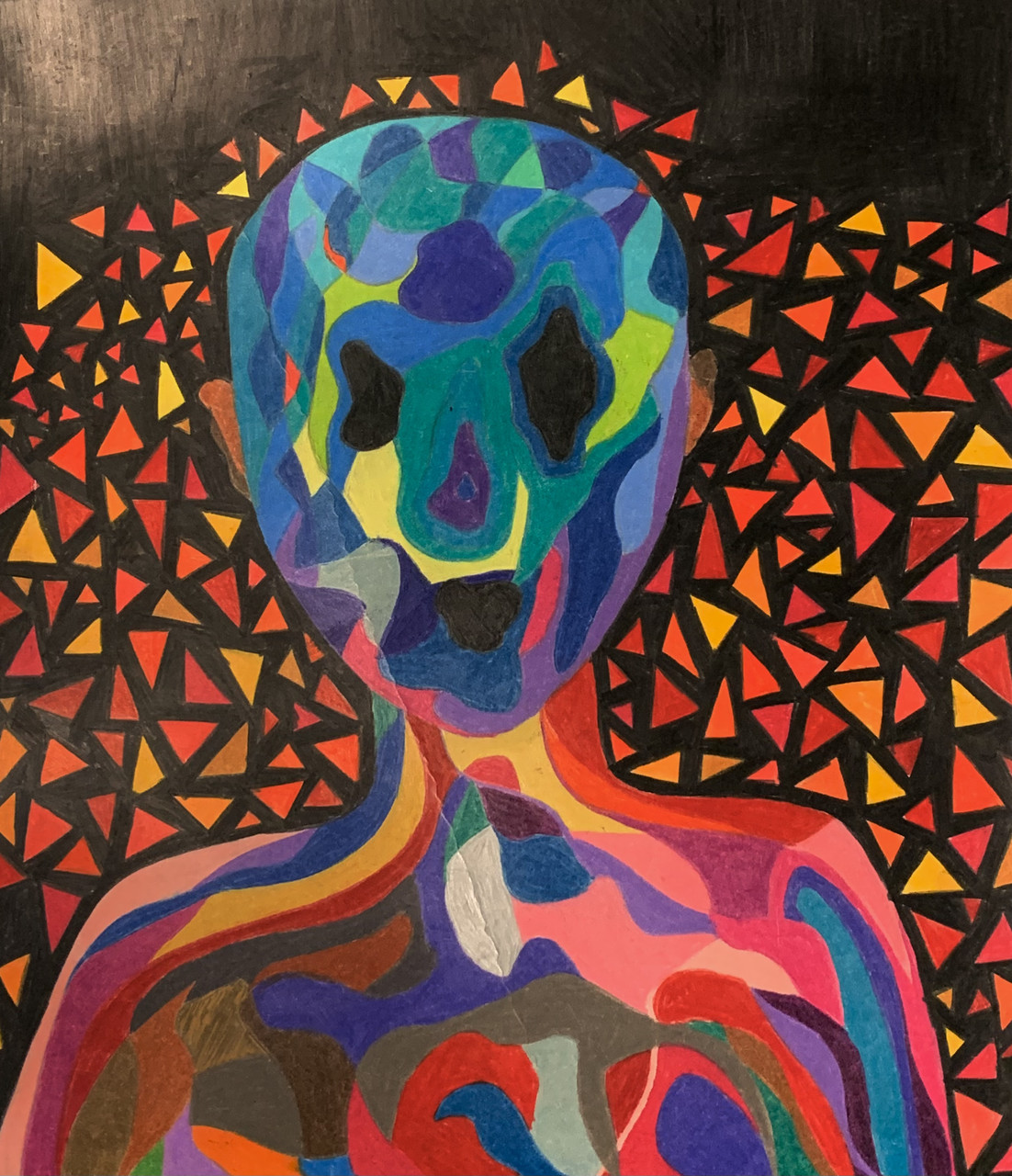 Bright marker drawing of a person with colors inside the profile