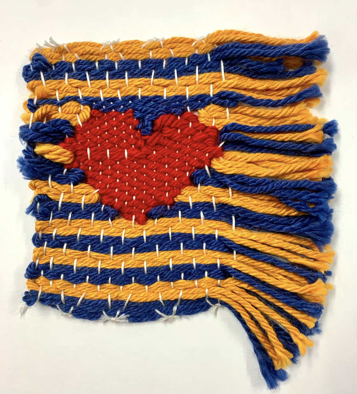 A heart design in a weaving