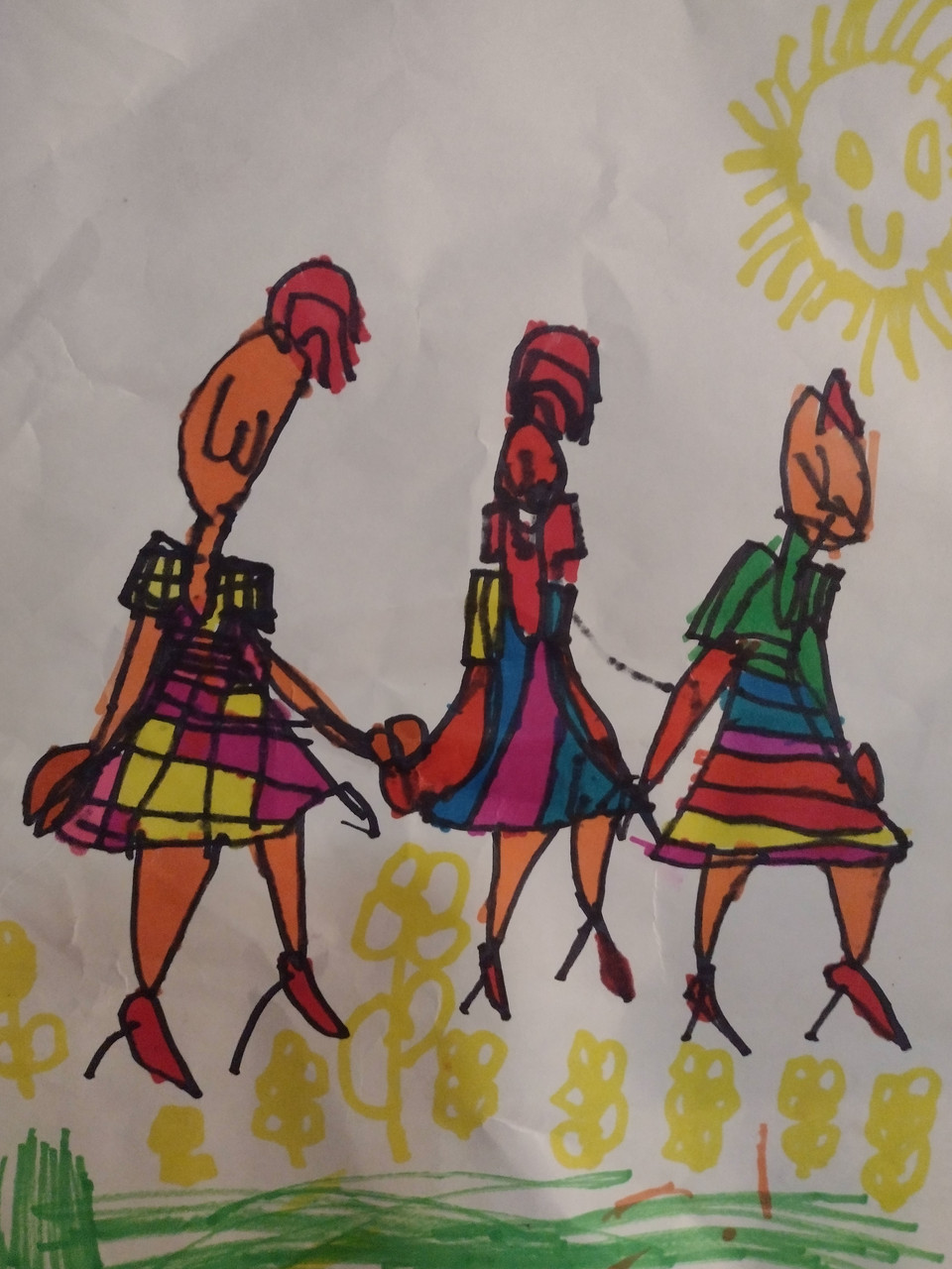 Drawing of three women in colorful dresses holding hands
