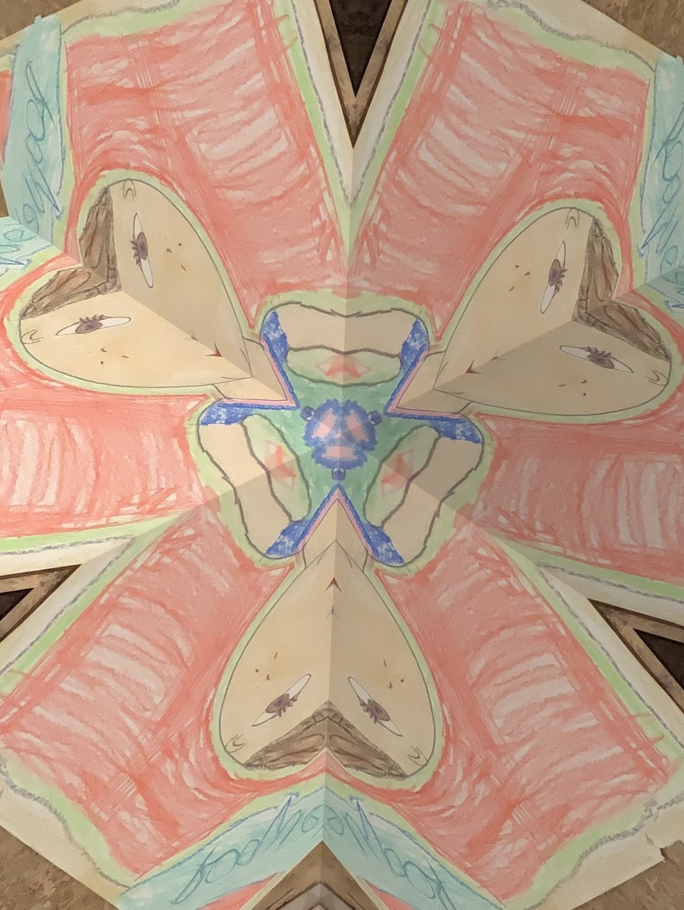 kaleidoscope style pattern of people and pink
