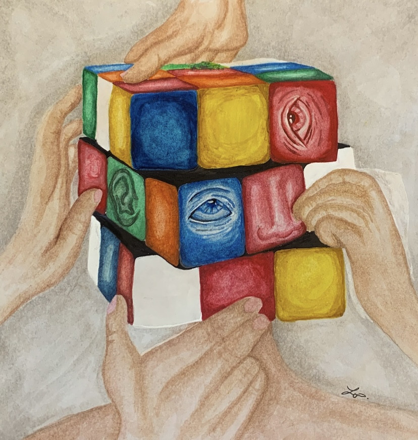 Rubix cube with many hands turning it and facial features on the colored squares
