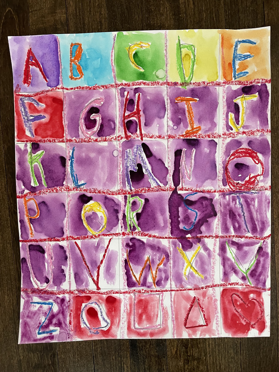 alphabet on a rainbow background