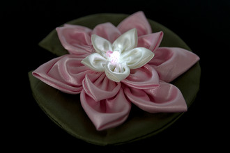 flower made of fabric with a light in the middle