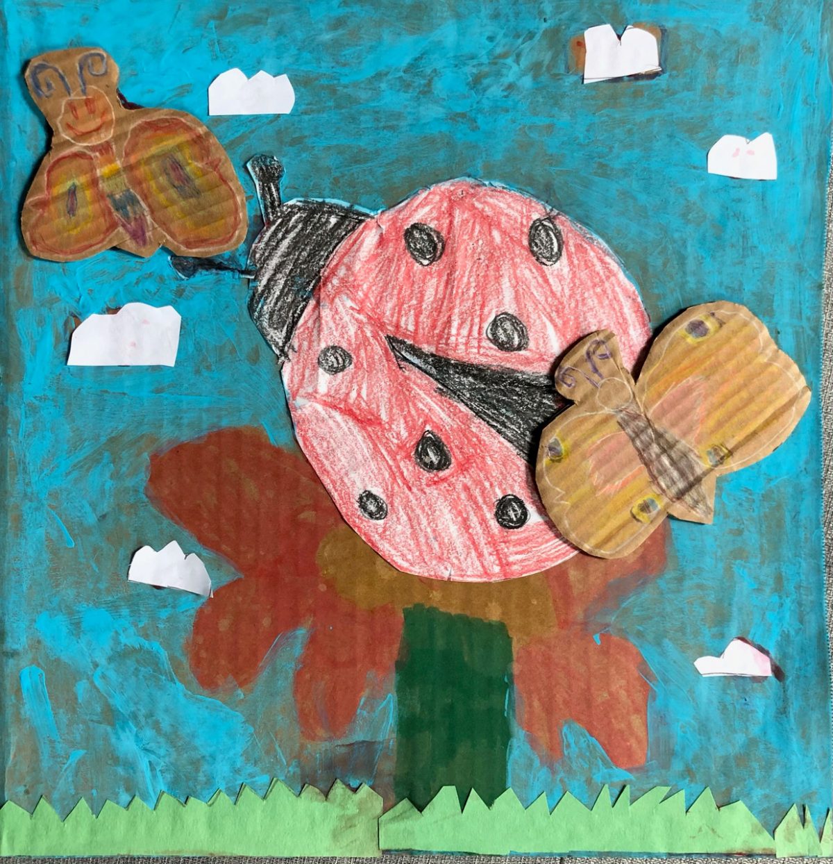 painting of a ladybug and butterflies
