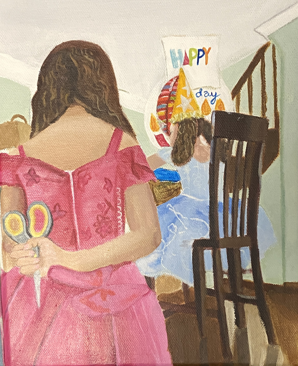 Girl with scissors at a birthday party.