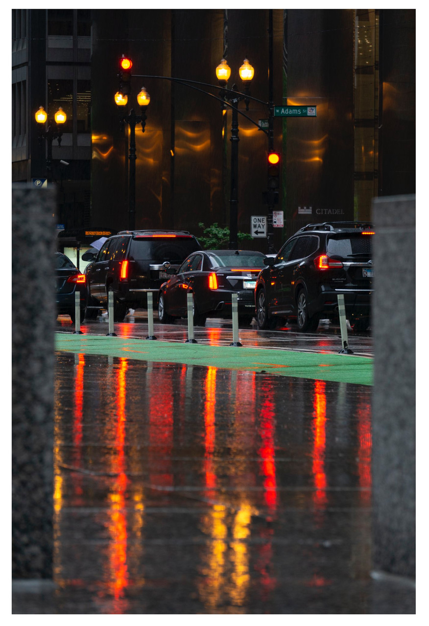 Photo of a line of cars in the evening
