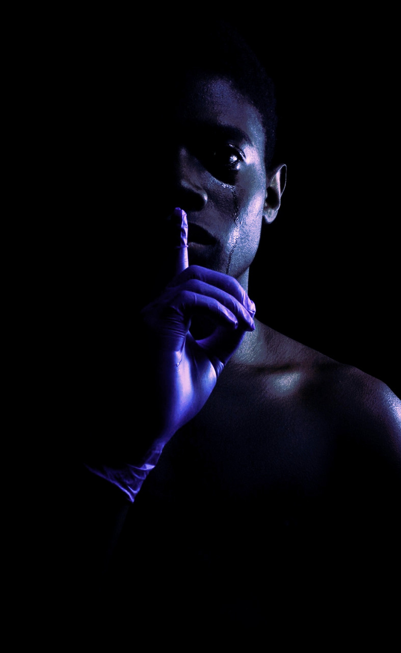 digital image of a person with finger to lips