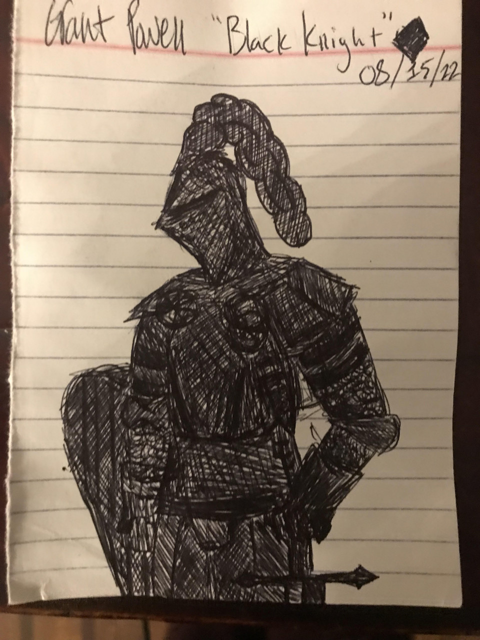 Black knight drawn on lined paper