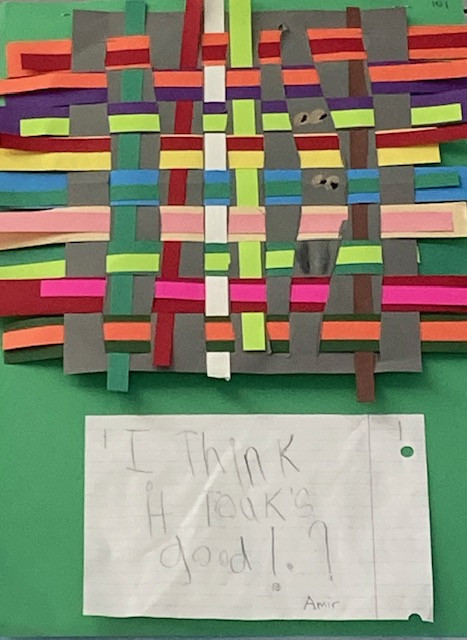 Weaved colorful papers into a black sheet.