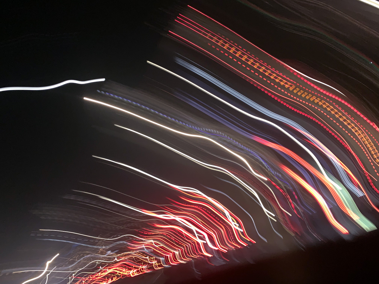 Long exposure of lights in a photograph.