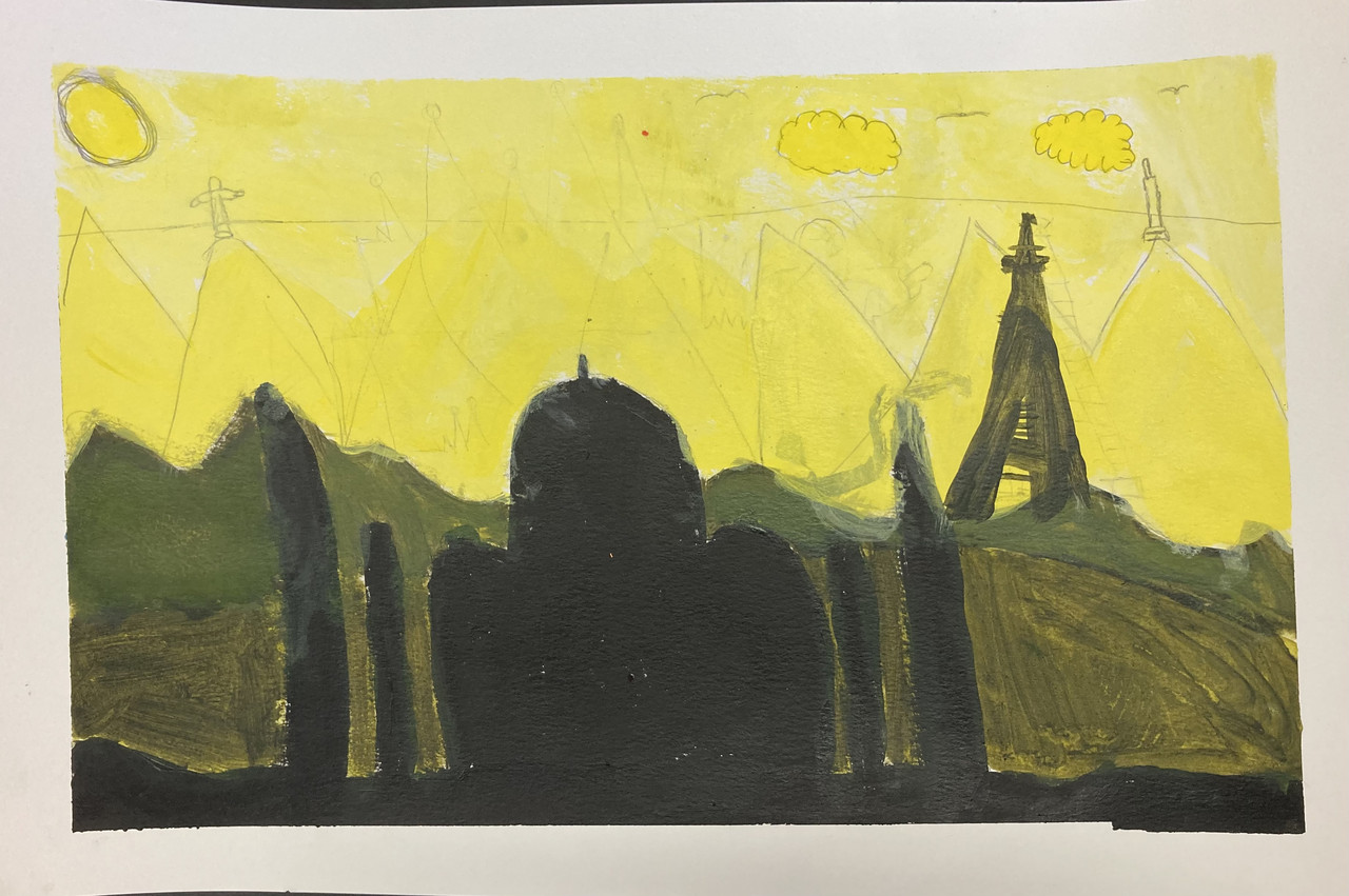 cityscape with black buildings and a yellow sky.