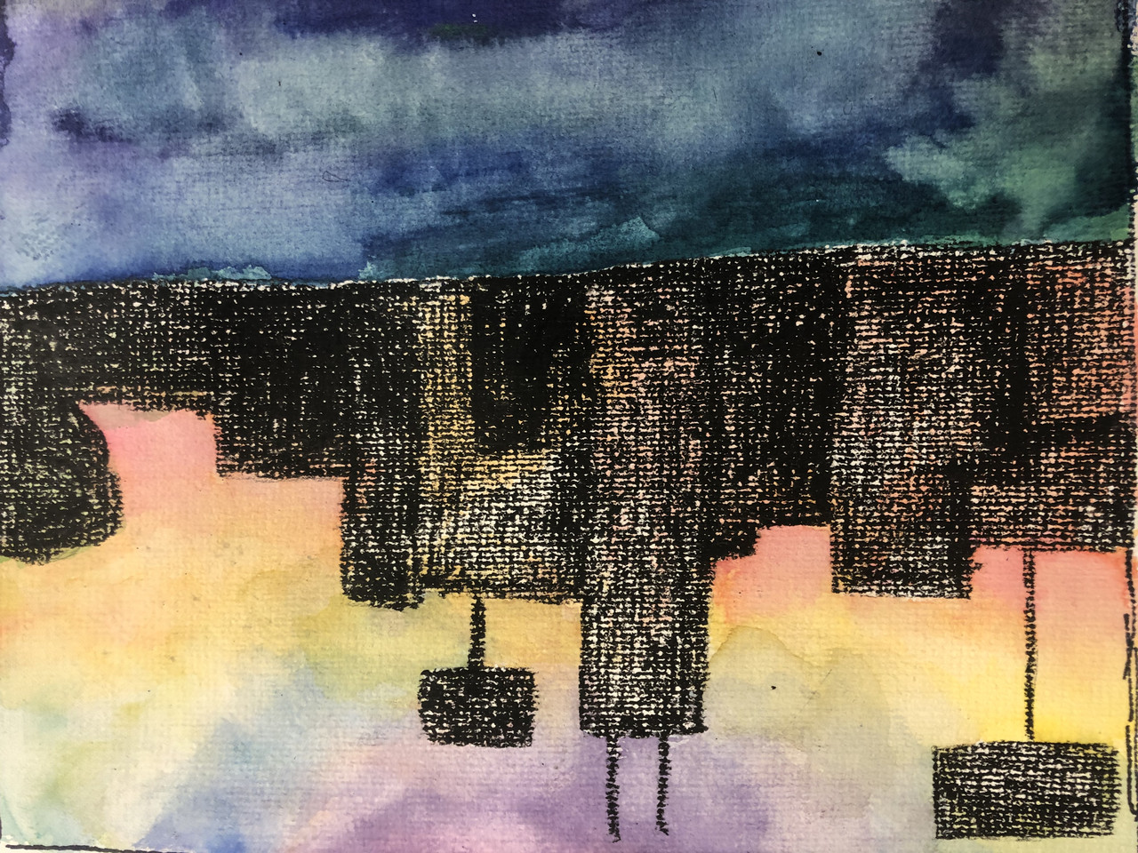 City skyscape in the evening created with watercolor and crayon.