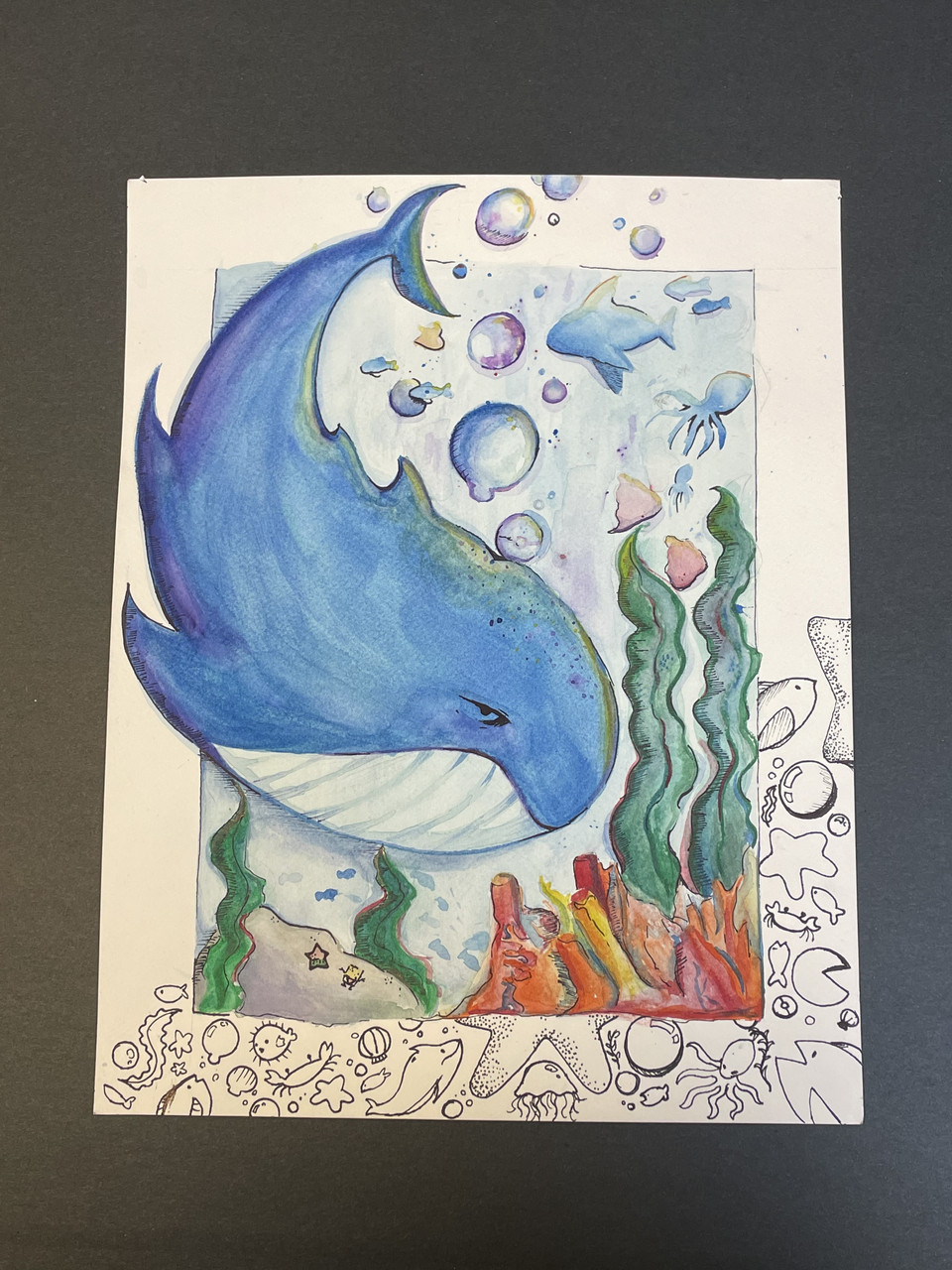Cartoon whale underwater.
