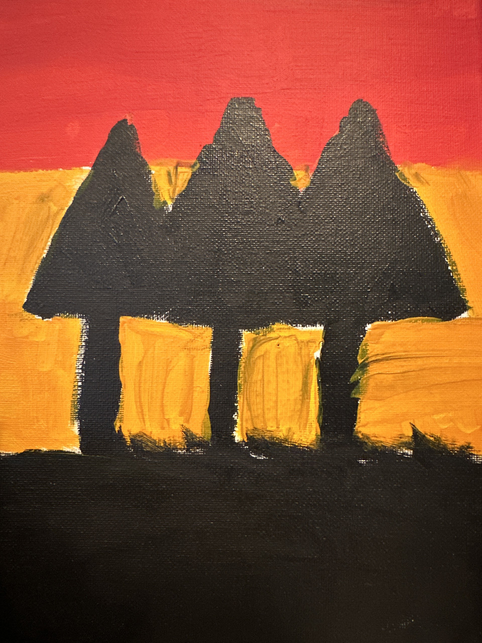 three black arrows pointing up over a red, yellow, and black stripe