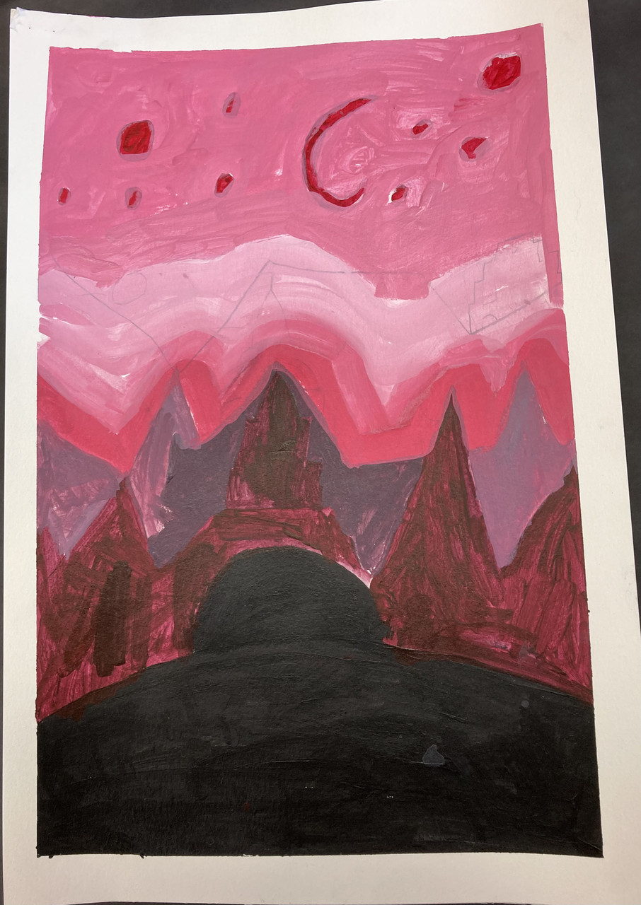 mountains in red and pink under a pink night sky