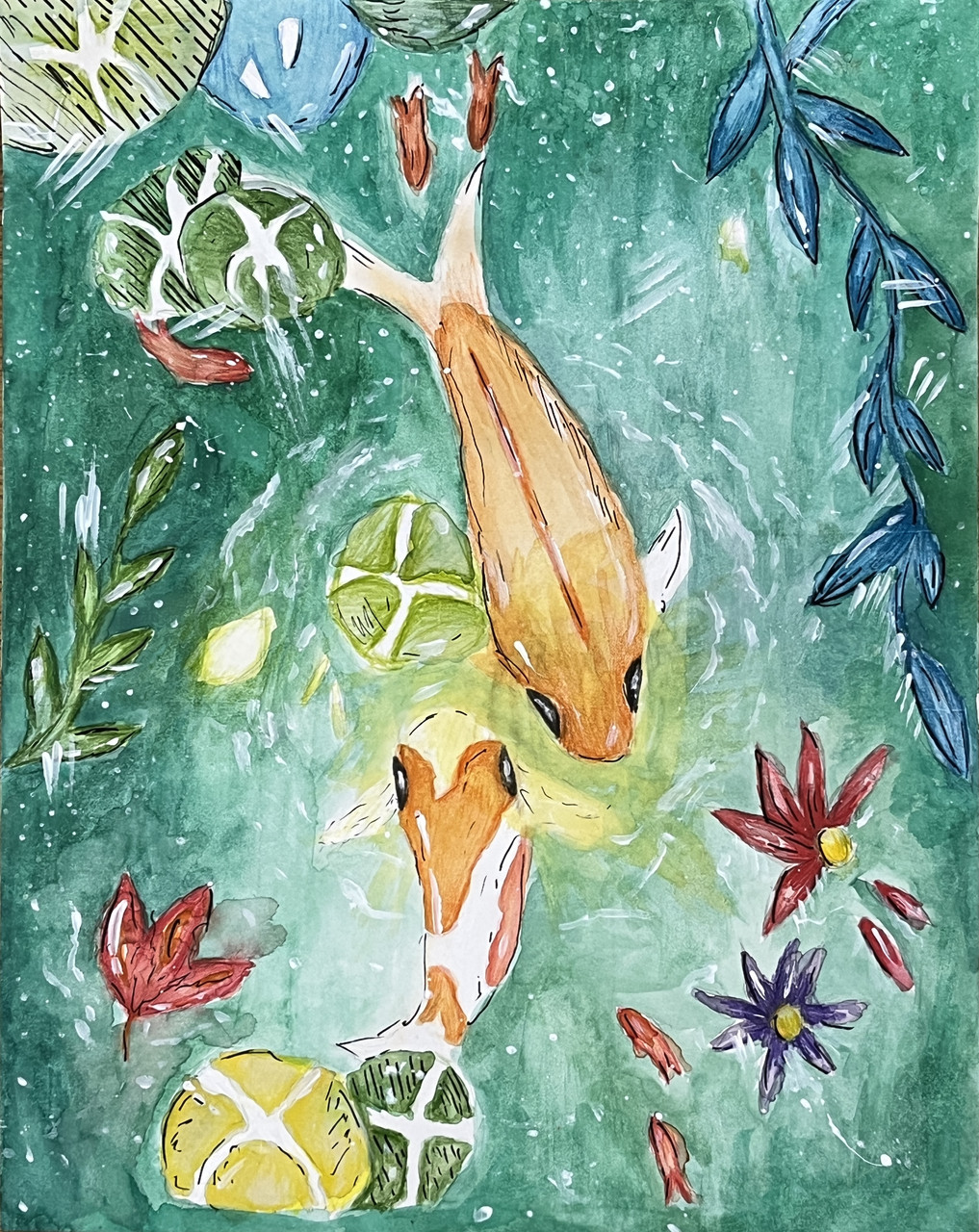 top view of 2 golden koi in blue water