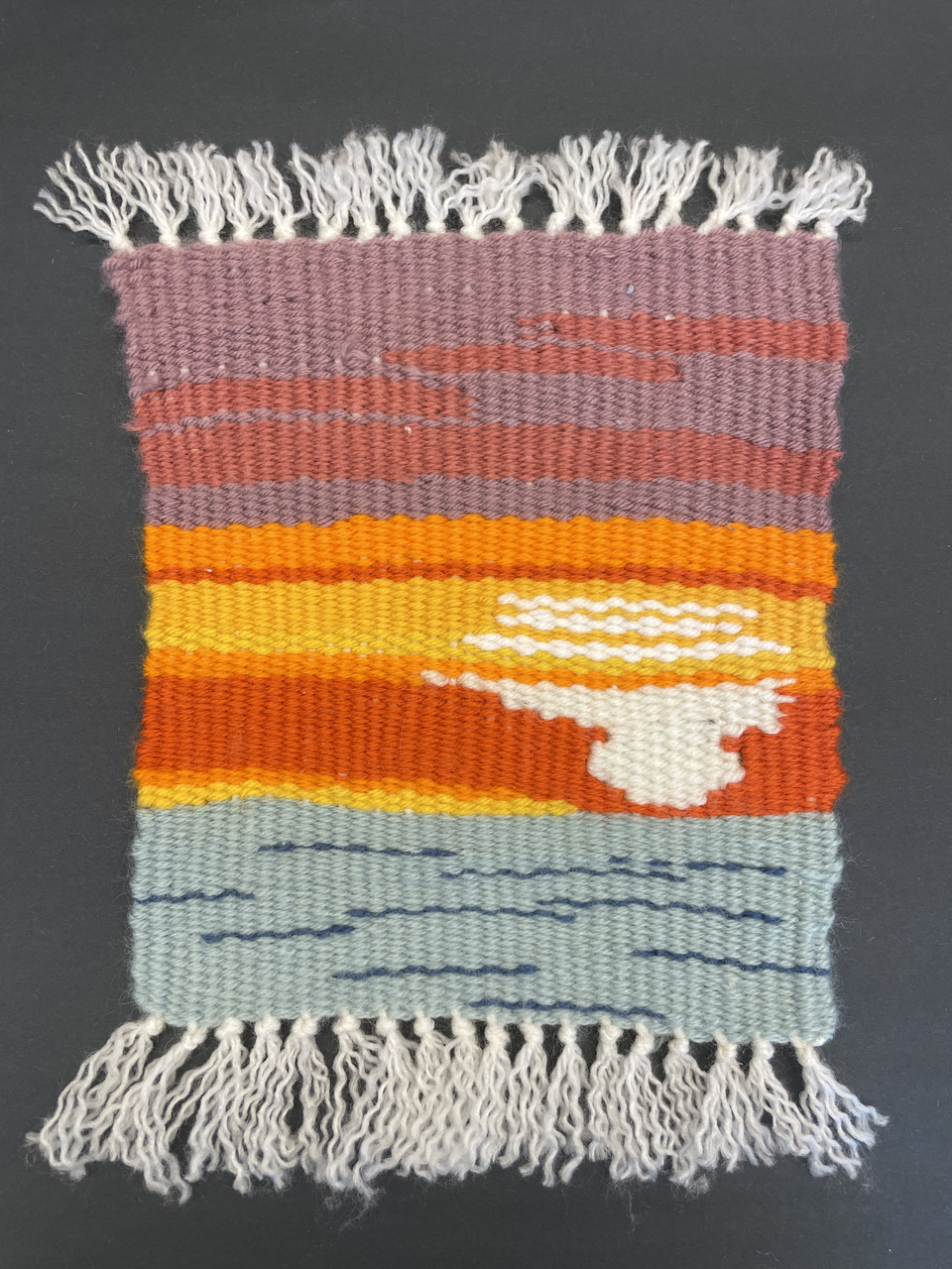 Fabric textile resembling a sunset.
