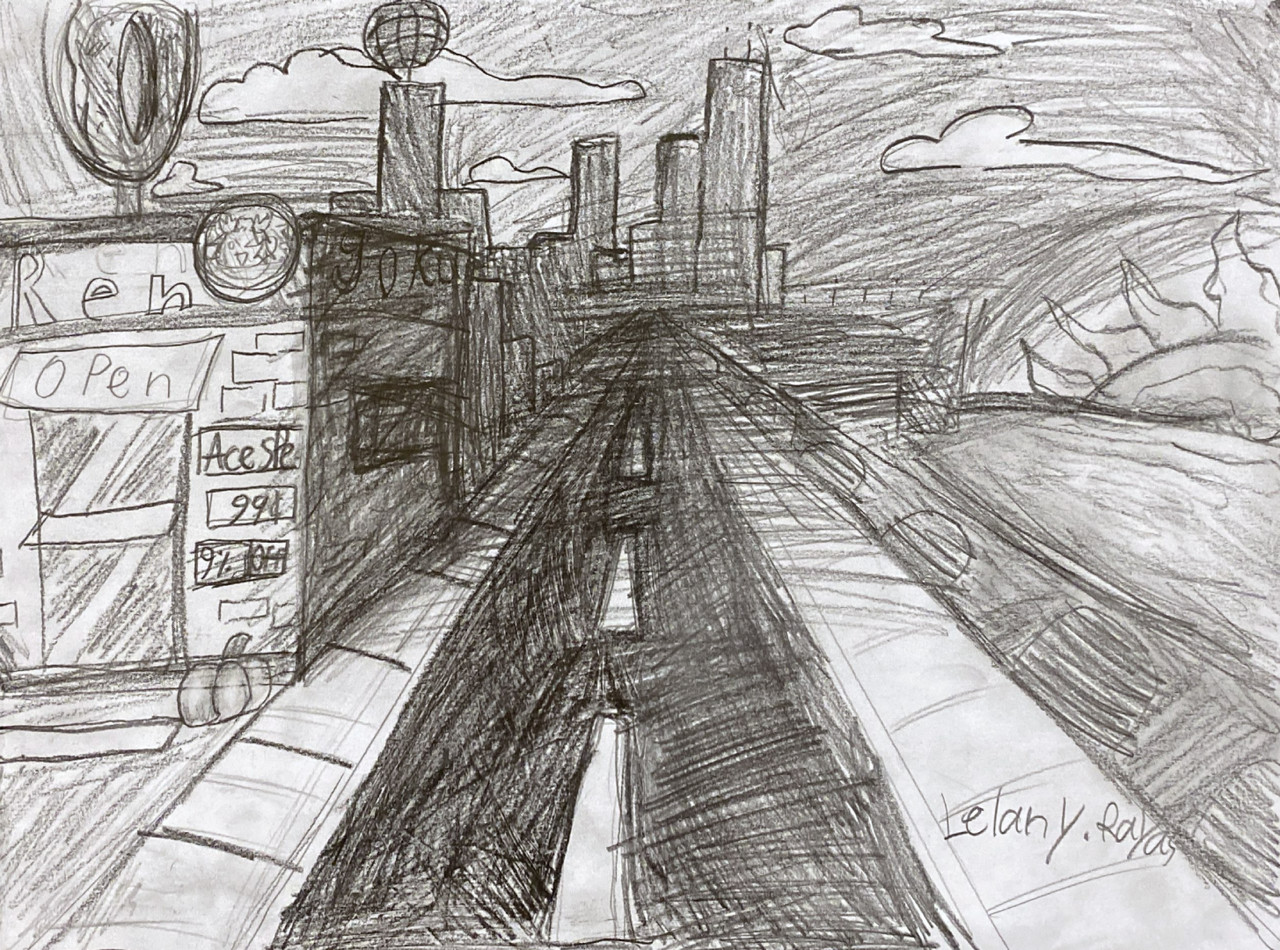 One point perspective of a city street.