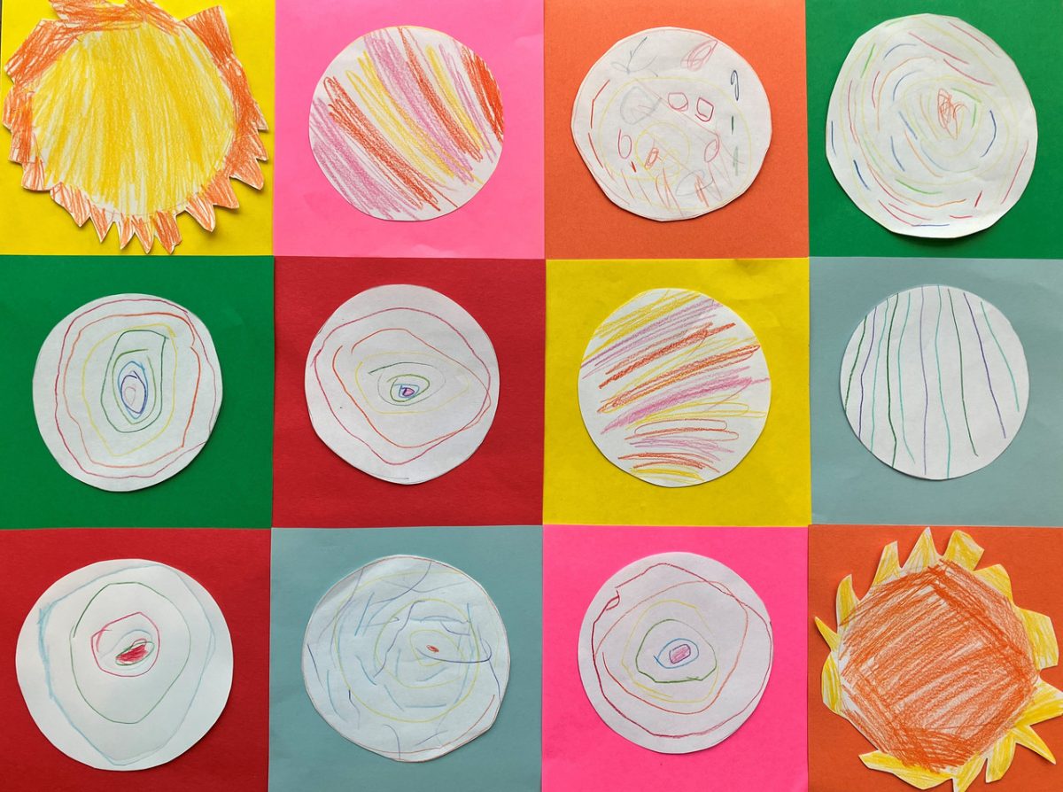 Circles lay on different color squares. Each circle is shaded differently.