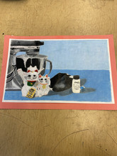 Art piece of kitchen appliances and other objects.