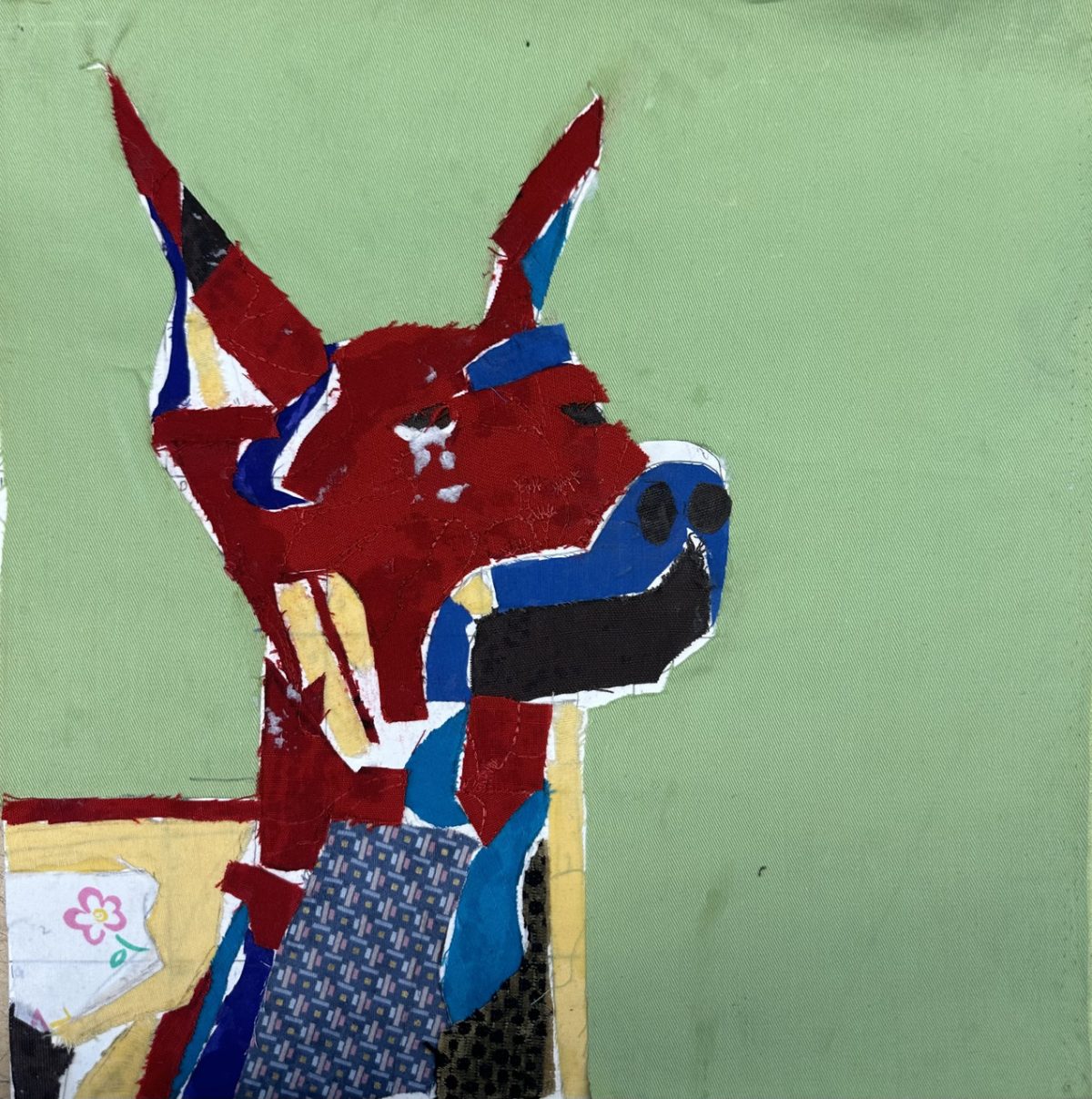 Collage of a doberman dog.