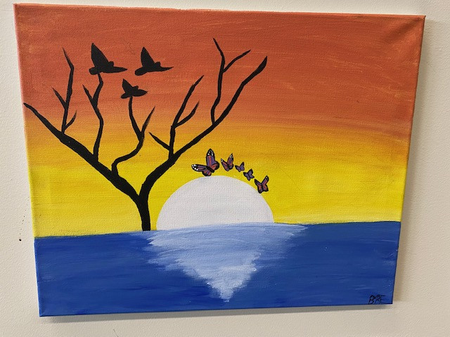 An acrylic painted sunset over water with butterflies and birds in the distance.